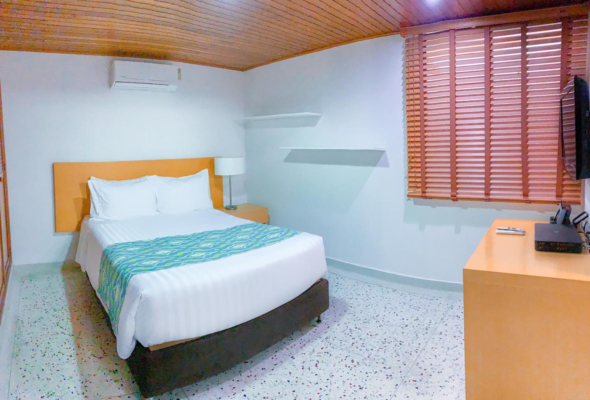 Hotel Dann Carlton Barranquilla Y Centro De Convenciones Dış mekan fotoğraf A bedroom at the hotel