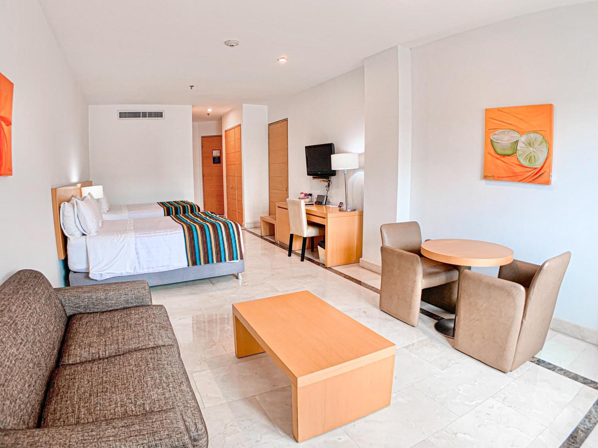 Hotel Dann Carlton Barranquilla Y Centro De Convenciones Dış mekan fotoğraf A room at the hotel